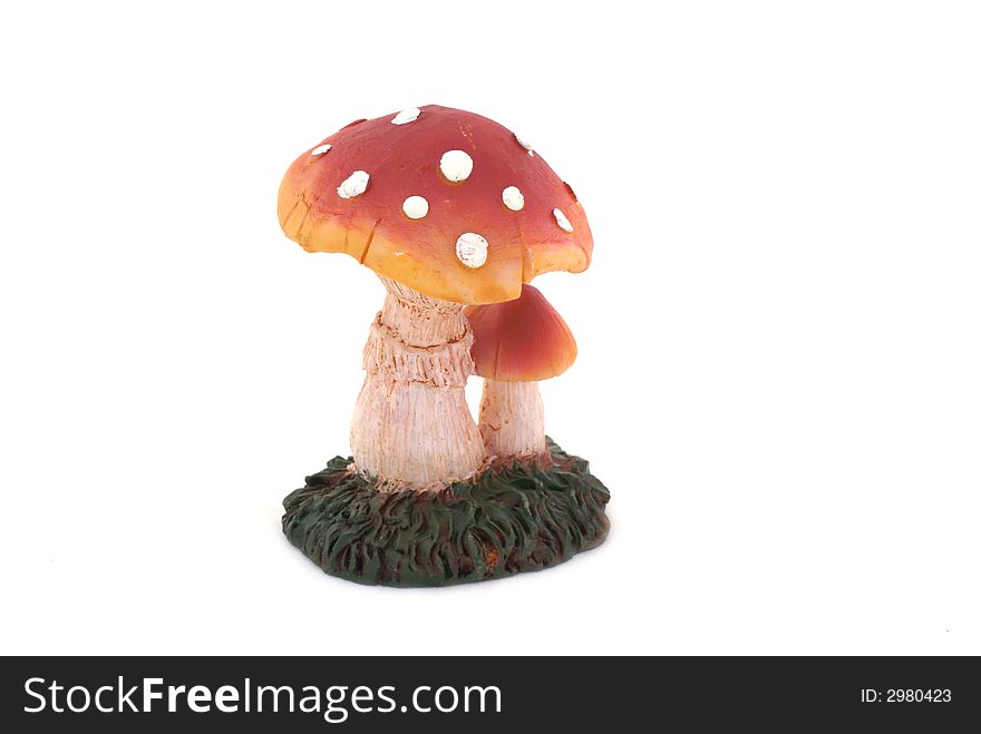 Toadstool with dots in front of a white background. Toadstool with dots in front of a white background.