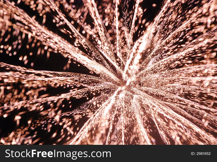 Time exposure photo of Fourth of July fireworks with the appearance of a star explosion in space, 3-D effect. Time exposure photo of Fourth of July fireworks with the appearance of a star explosion in space, 3-D effect.