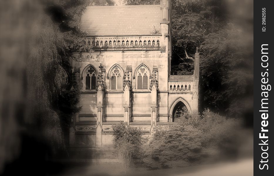 Spooky Gothic crypt on secluded graveyard road