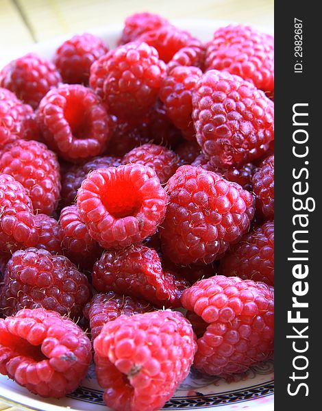 Red taste raspberries - macro photo