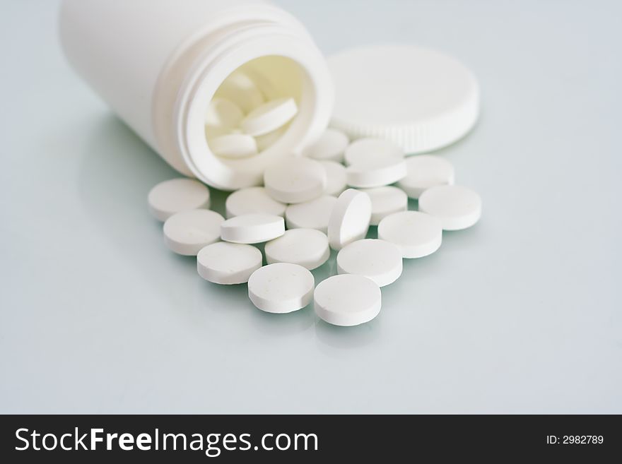 The written out tablets laying on a table on a background