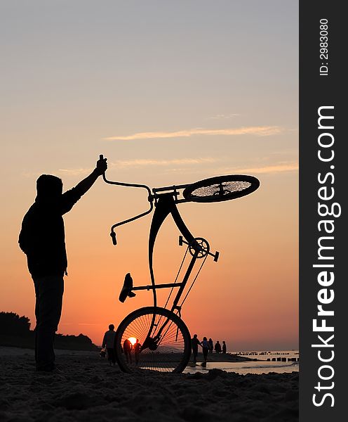 Bikers admiring sunrise during cloudy day