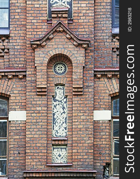 Ornamented Brick Facade of Old Building