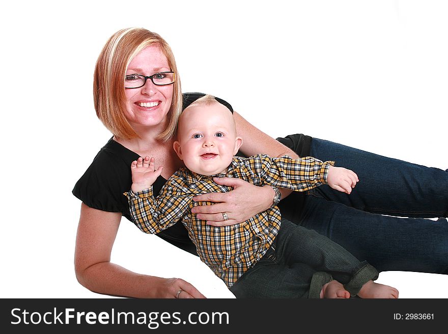 Mother and her smiling baby boy. Mother and her smiling baby boy