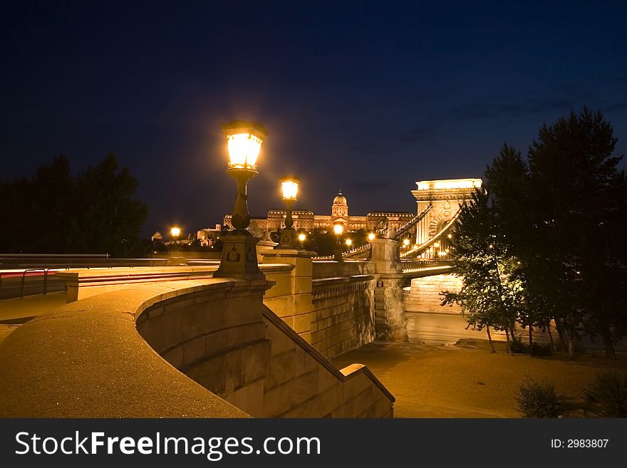 Budapest by Night, view on the Chain Bridge over the river Danube, and the castle.