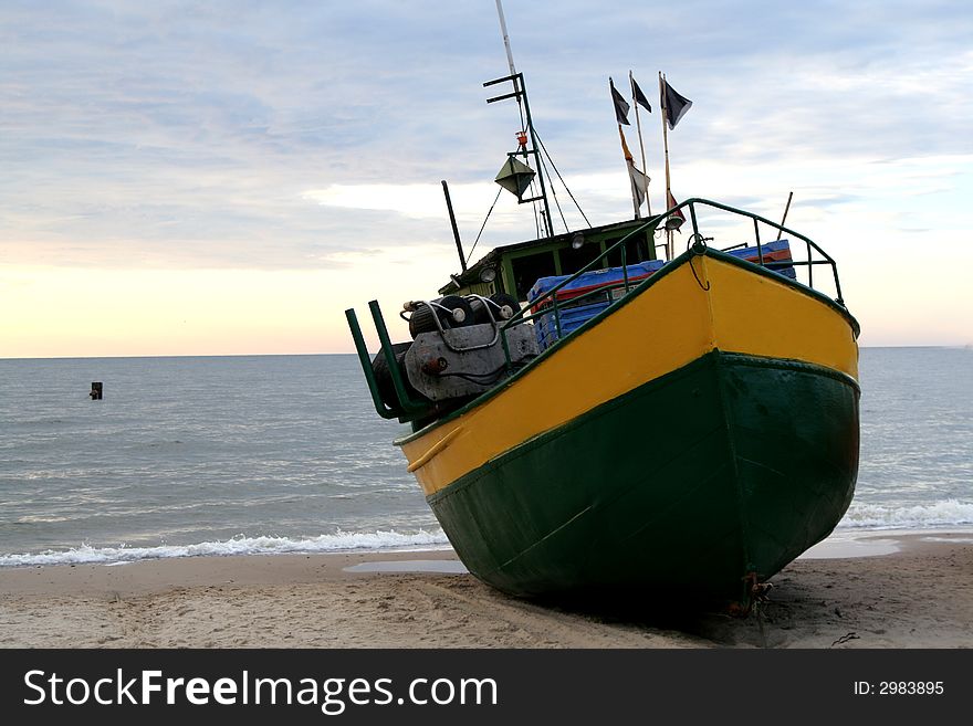 A Few Fishing Boats At The Baltic Sea at the sundown