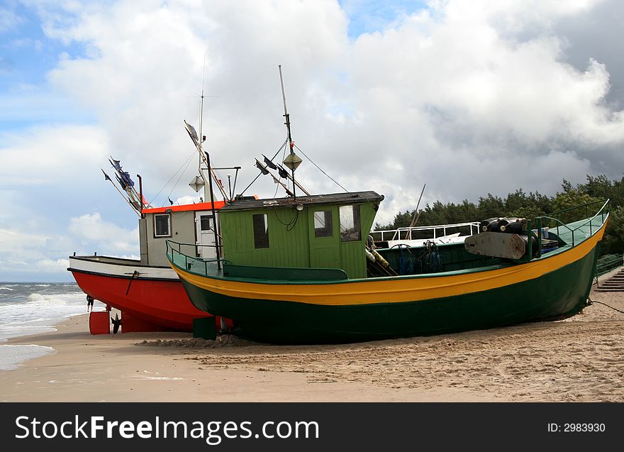 A Few Fishing Boats At The Baltic Sea at the sundown