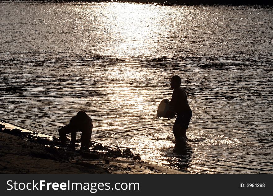 Man silhouette in the river