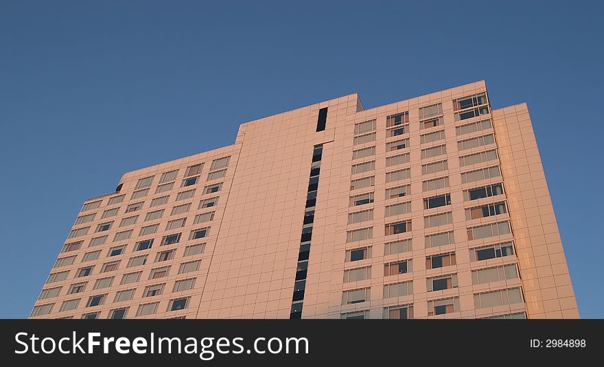 A modern white hotel in the dawn light. A modern white hotel in the dawn light