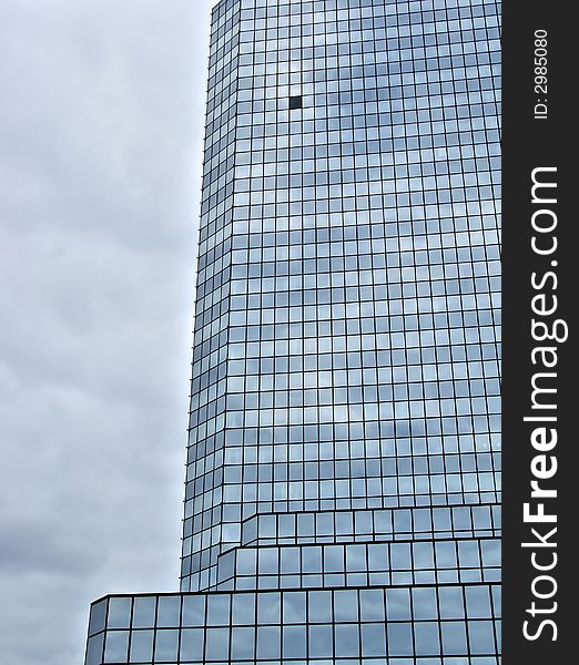 Blue glass skyscraper in the city of Warsaw in Poland. Blue glass skyscraper in the city of Warsaw in Poland