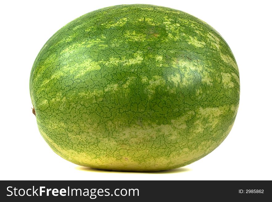 A natural garden patch watermelon with textured skin isolated on white. A natural garden patch watermelon with textured skin isolated on white