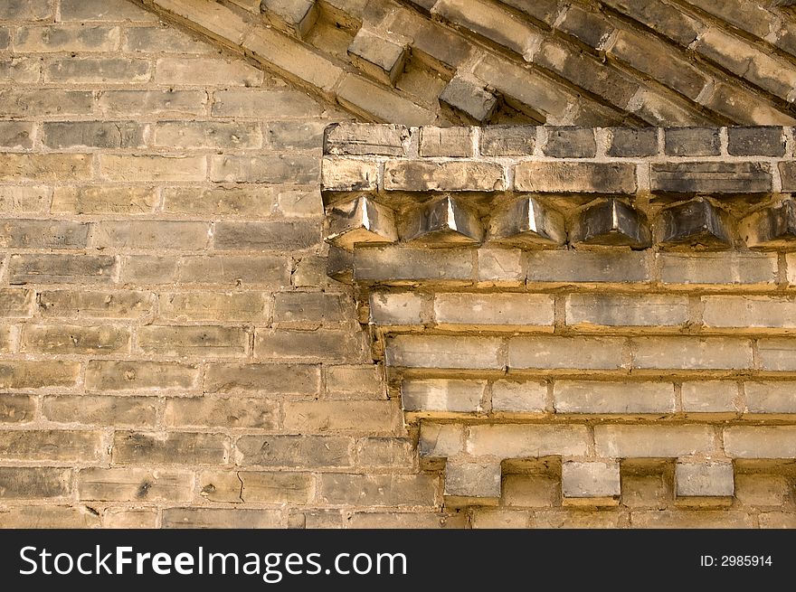 Old yellow styled brick pattern from a rustic building. Old yellow styled brick pattern from a rustic building