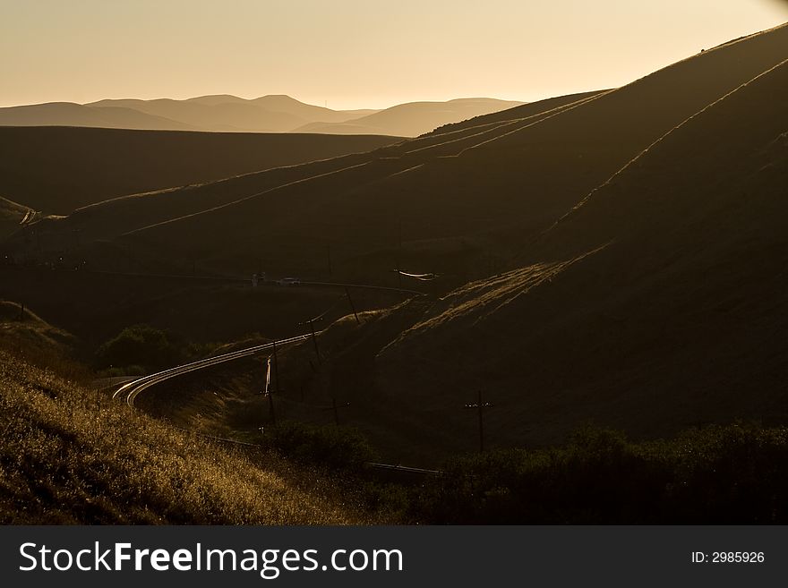 Rail road weaving its way through hills of Northern California. Rail road weaving its way through hills of Northern California