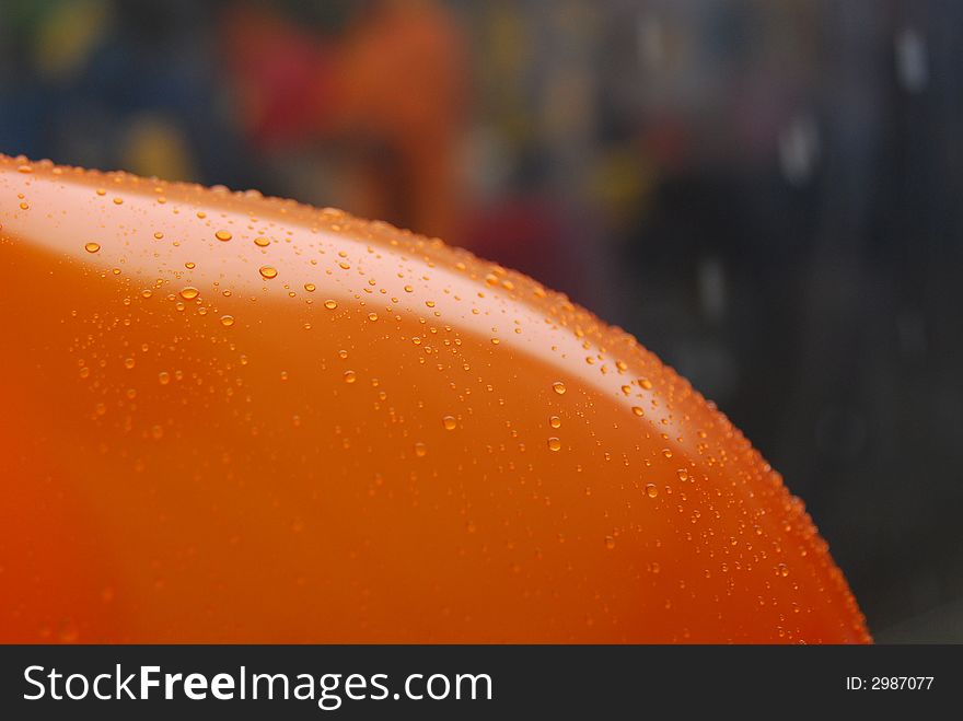 Colorful balloon and water droplets