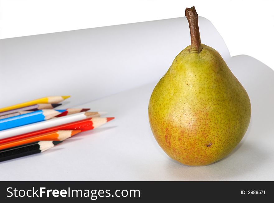 Pencils And Yellow Pear