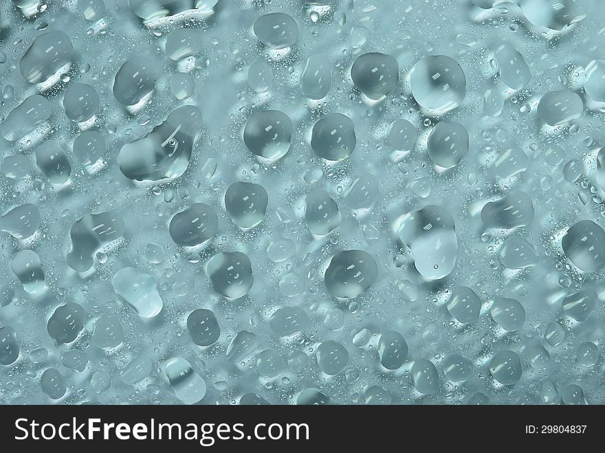 Water Drop On Glass Background