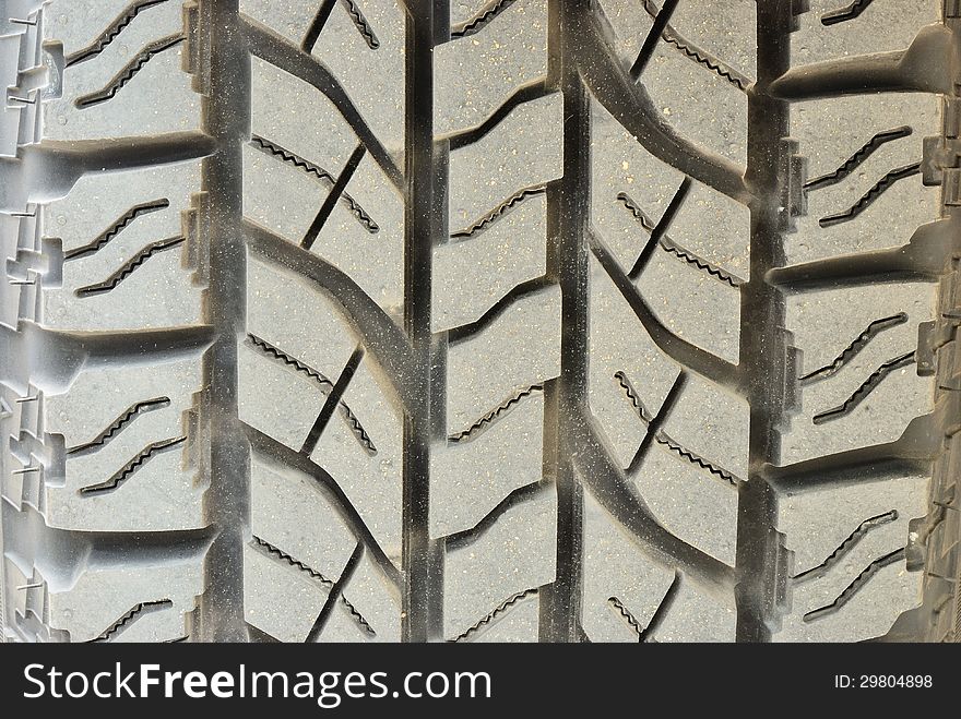 Close up on dirty tire foot print background