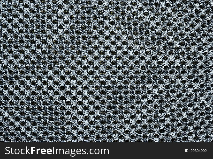 Close up on black nylon fabric background