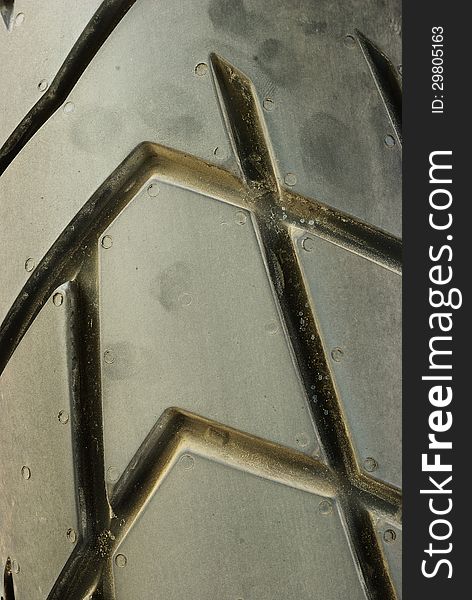 Close up on motocycle tire texture background. Close up on motocycle tire texture background