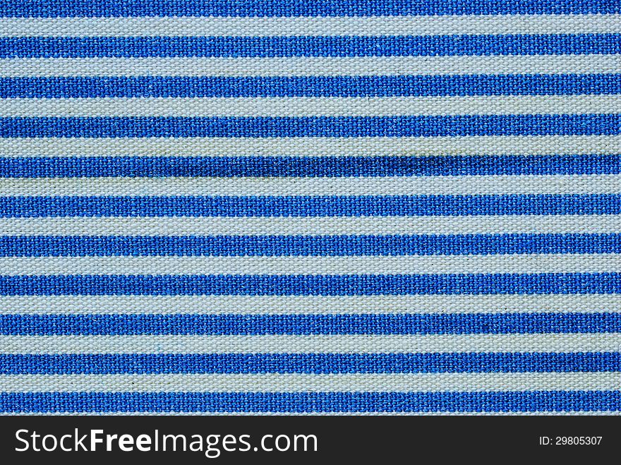 Close up on blue and white line fabric