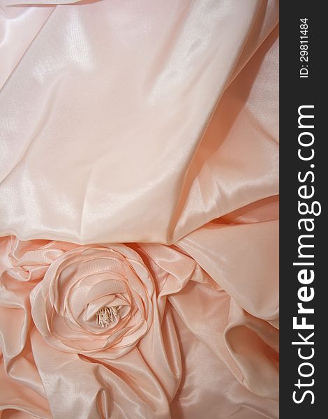 A material rose detail on a wedding dress. Image can also be used for formal nightgown. A material rose detail on a wedding dress. Image can also be used for formal nightgown.