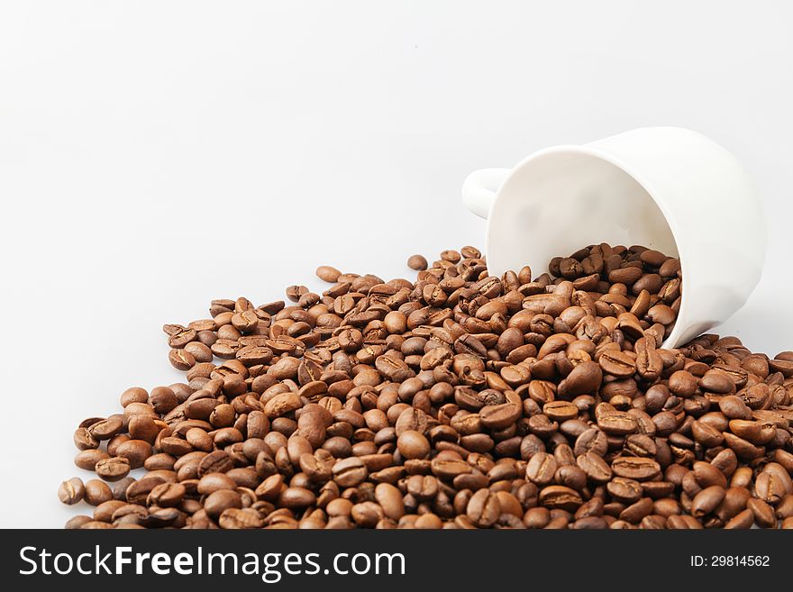 Coffee Beans background with white cup. See my other works in portfolio.