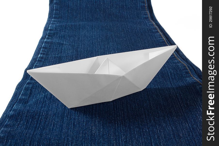 Paper Boat On Blue Jeans