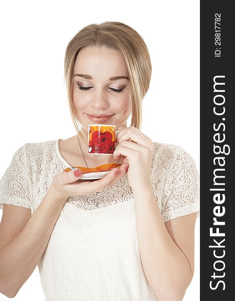Portrait of dreamy woman in a white dress with cup of coffee on a plate, isolated on white background. Portrait of dreamy woman in a white dress with cup of coffee on a plate, isolated on white background.