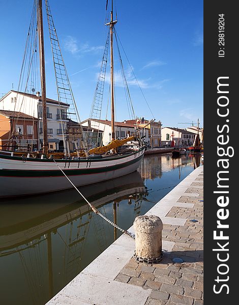 Old boats in the channel of Cesenatico