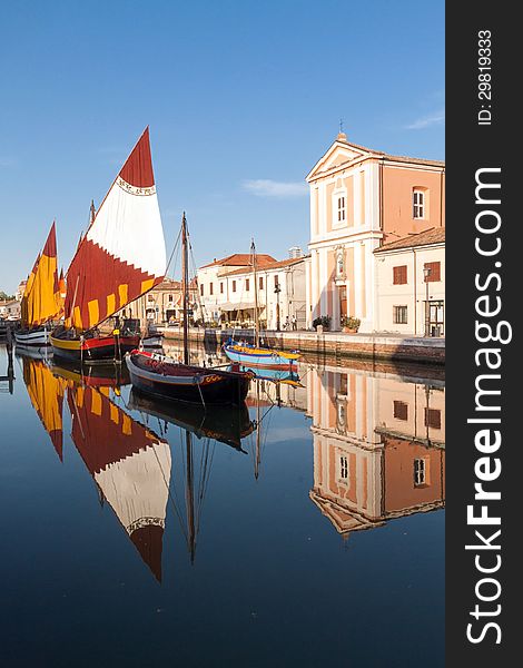 Old boats in the channel of Cesenatico