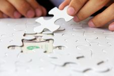 Hand Holding A Puzzle Piece, Money Concept Stock Images Hand Holding A Puzzle Piece, Money Concept Stock Images