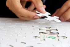 Hand Holding A Puzzle Piece, Money Concept Royalty Free Stock Photo Hand Holding A Puzzle Piece, Money Concept Royalty Free Stock Photo