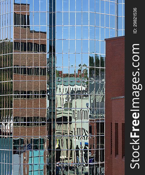 Downtown St. John&#x27;s reflected in the windows of glass buildings on Water Street. Downtown St. John&#x27;s reflected in the windows of glass buildings on Water Street.