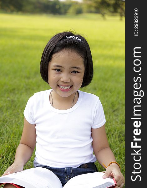 Asian Girl Reading Book