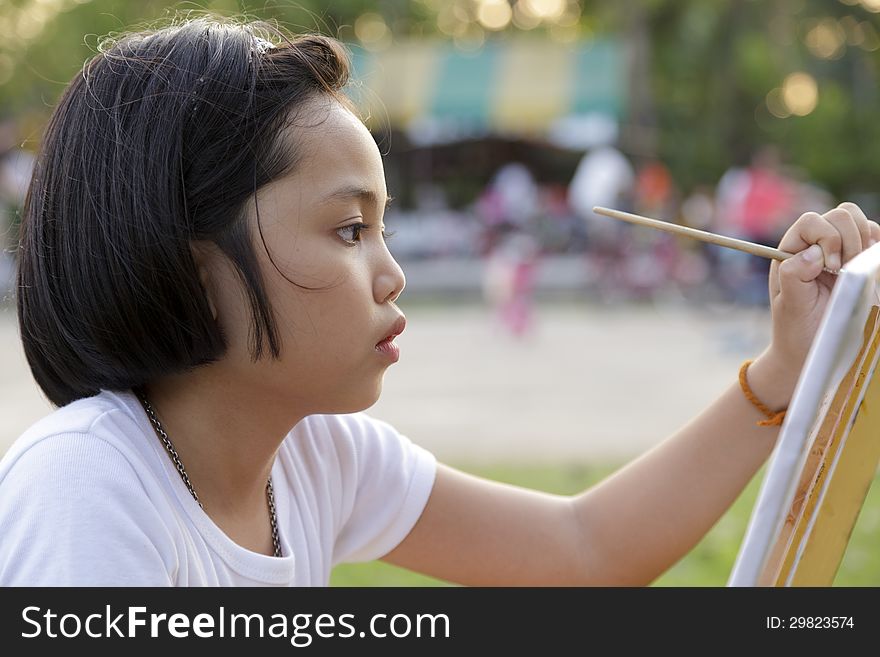 Girl Painting In In The Park