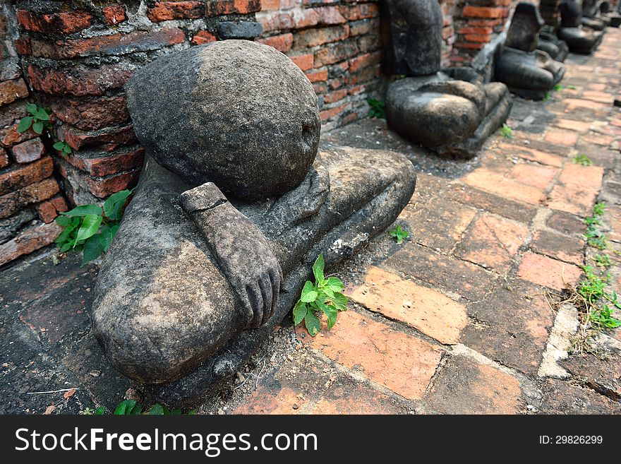 Broken Buddha Statue in Wat Phra Mahathat, Ayutthaya, Thailand. Broken Buddha Statue in Wat Phra Mahathat, Ayutthaya, Thailand