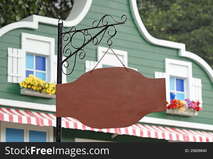 Hanging blank wooden sign post. Hanging blank wooden sign post.