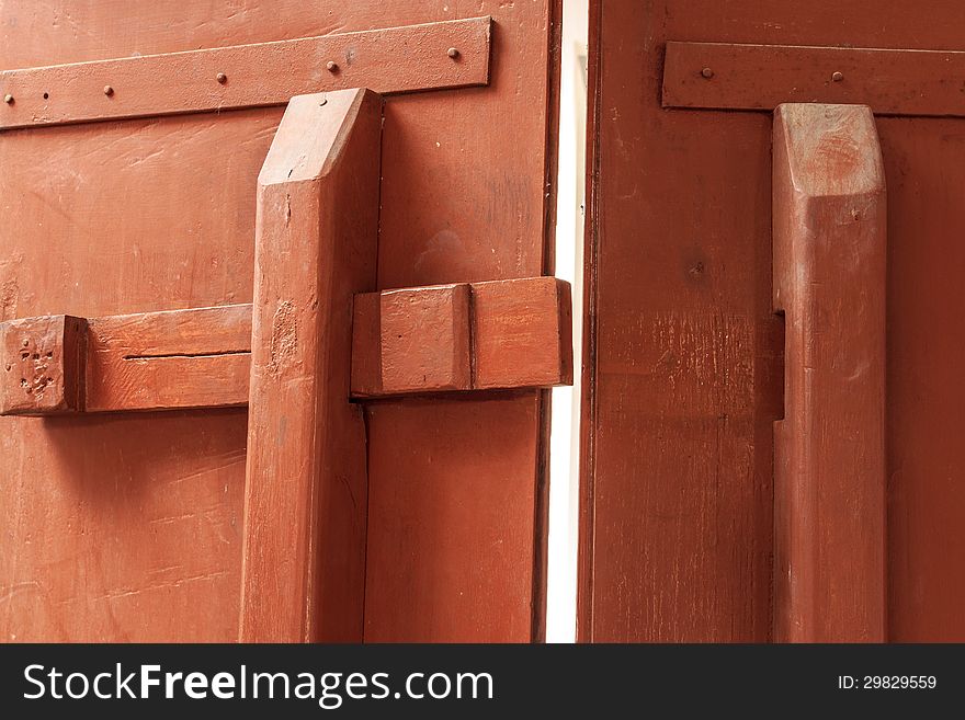 Image of the Chainese style Wooden Latch with the door being open.