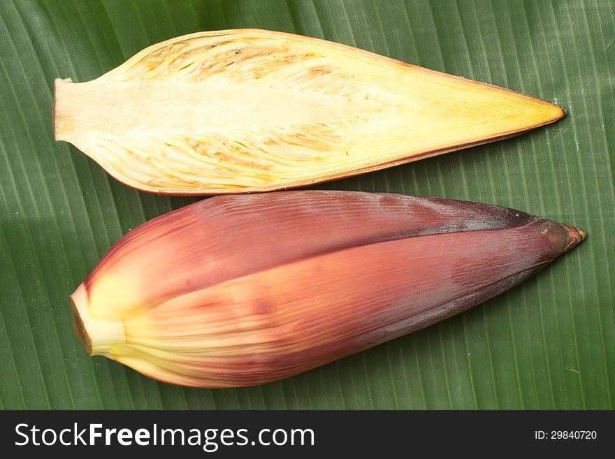 Banana flower on banana leaf