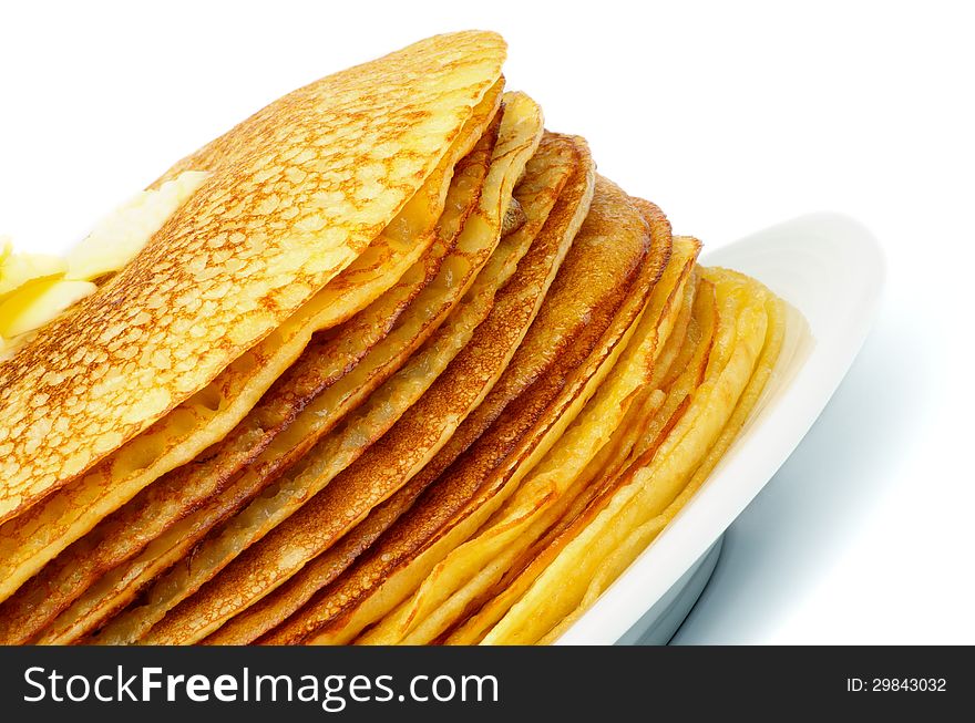 Stack of Delicious Thin Pancakes with Butter on White Plate closeup. Stack of Delicious Thin Pancakes with Butter on White Plate closeup