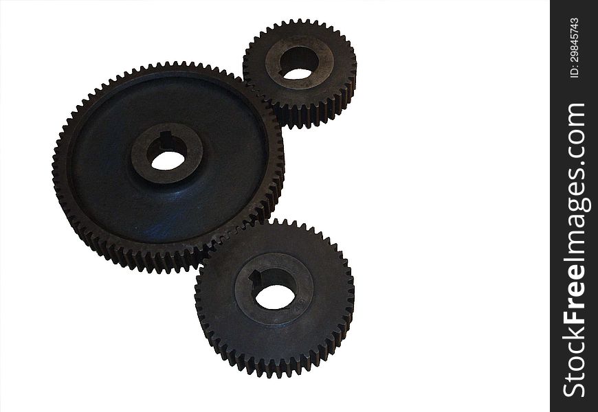 A Set of Three Solid Metal Black Cog Wheels.