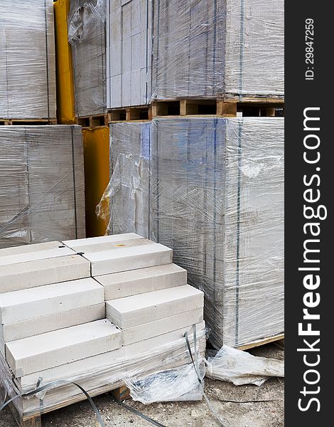 White aerated concrete blocks on wooden pallet