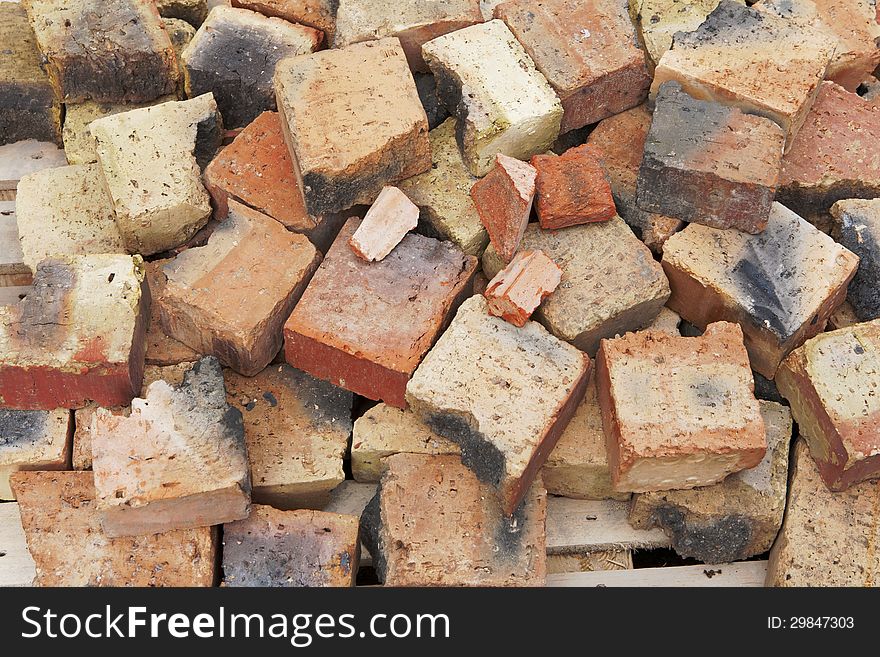 Broken bricks background on yard