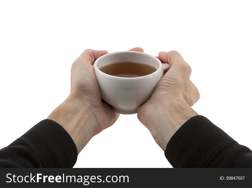 Man&#x27;s hands holding cup of tea