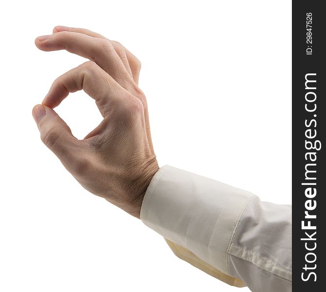 Man's hand shows okay gesture isolated on white background. Man's hand shows okay gesture isolated on white background