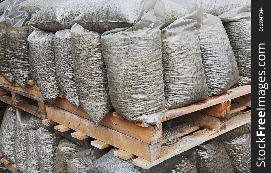 Construction stones on wooden pallet at storehouse. Construction stones on wooden pallet at storehouse