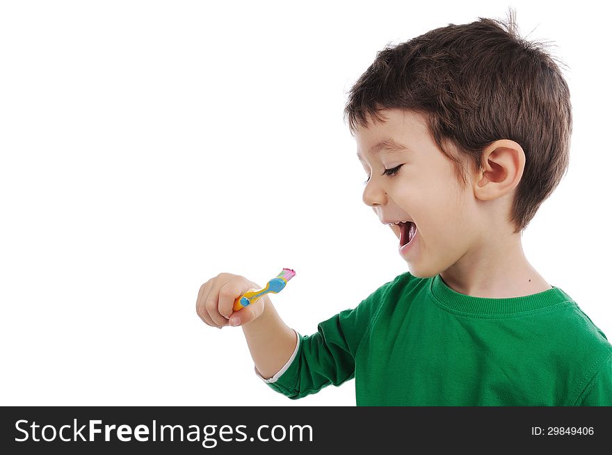 White boy is brushing his teeth. White boy is brushing his teeth.