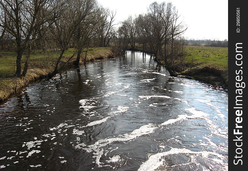 The image of flood on the river in the spring. The image of flood on the river in the spring