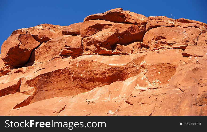 Red Rock mountain up close in Arizona, USA with vivid blue sky. Red Rock mountain up close in Arizona, USA with vivid blue sky.