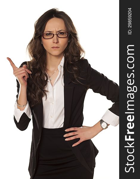 Dissatisfied and angry business woman showing thumbs down. Dissatisfied and angry business woman showing thumbs down